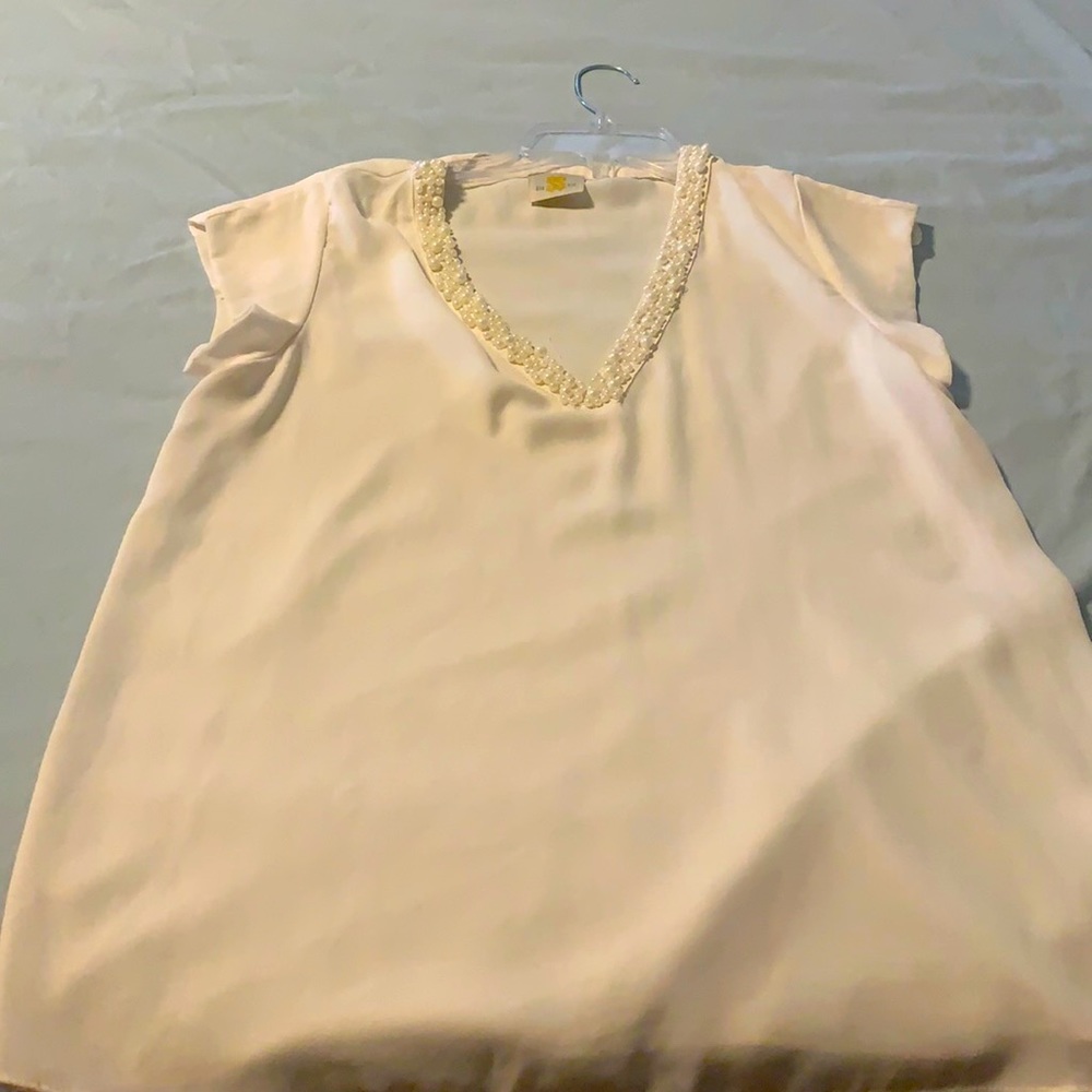 Ivory top with pearl accents